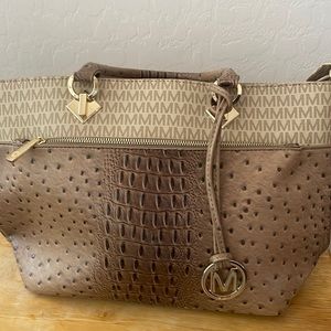 Lovely purse, tan/beige/brown with gold accents.